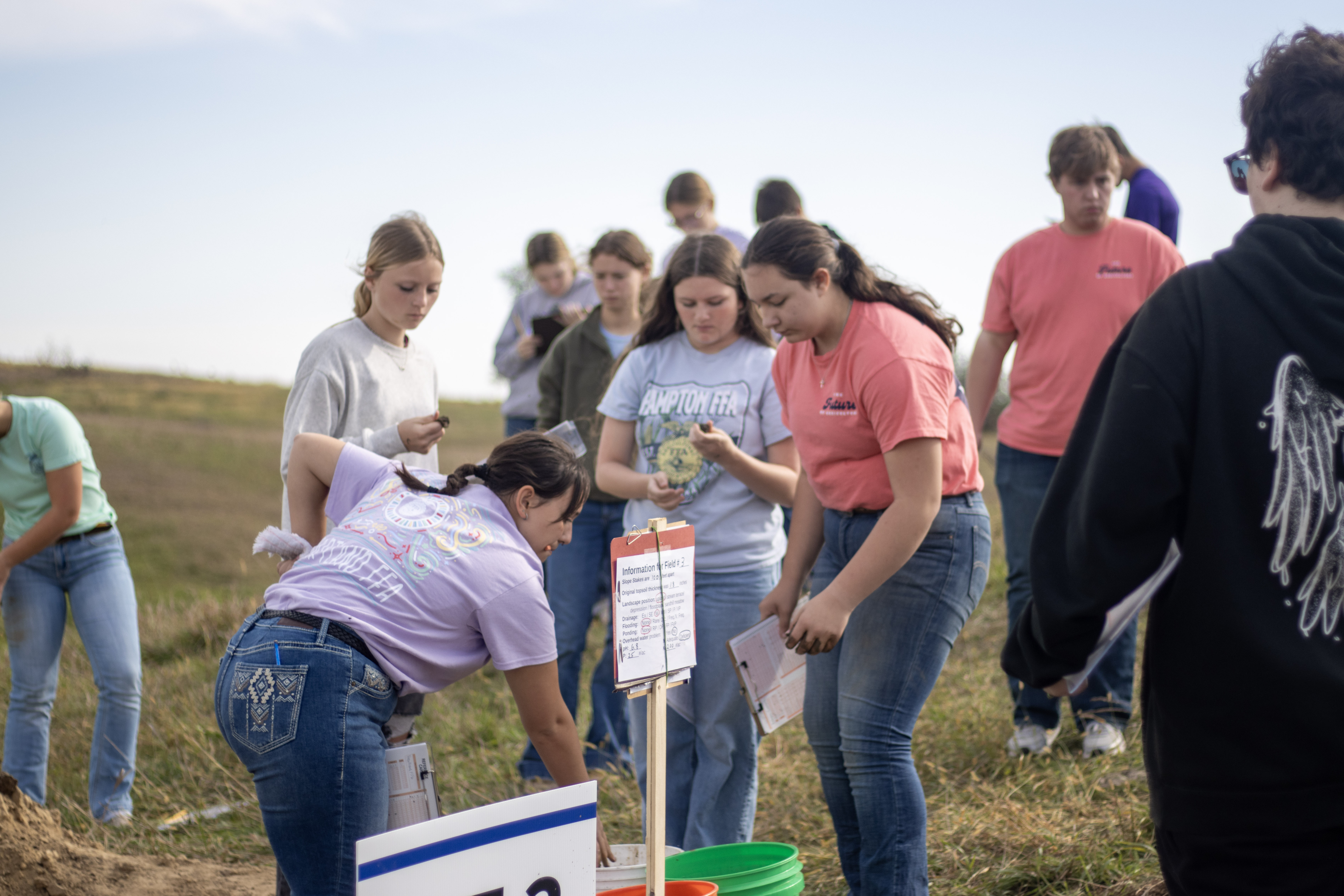 students get hands-on feel for dirt from the pit