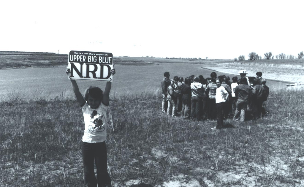 Girl holding UBBNRD sign