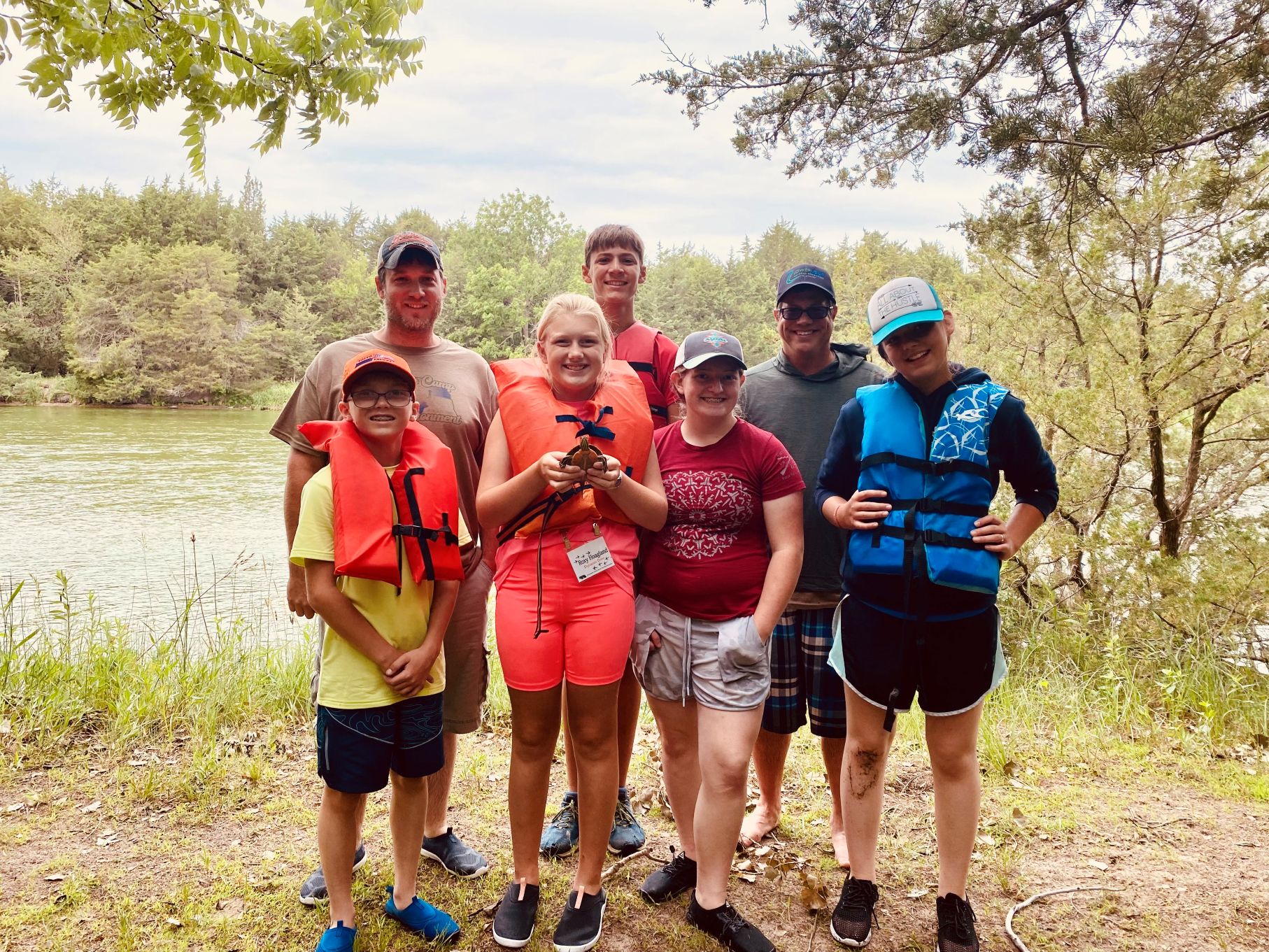 ACE Camp participants hold a turtle.