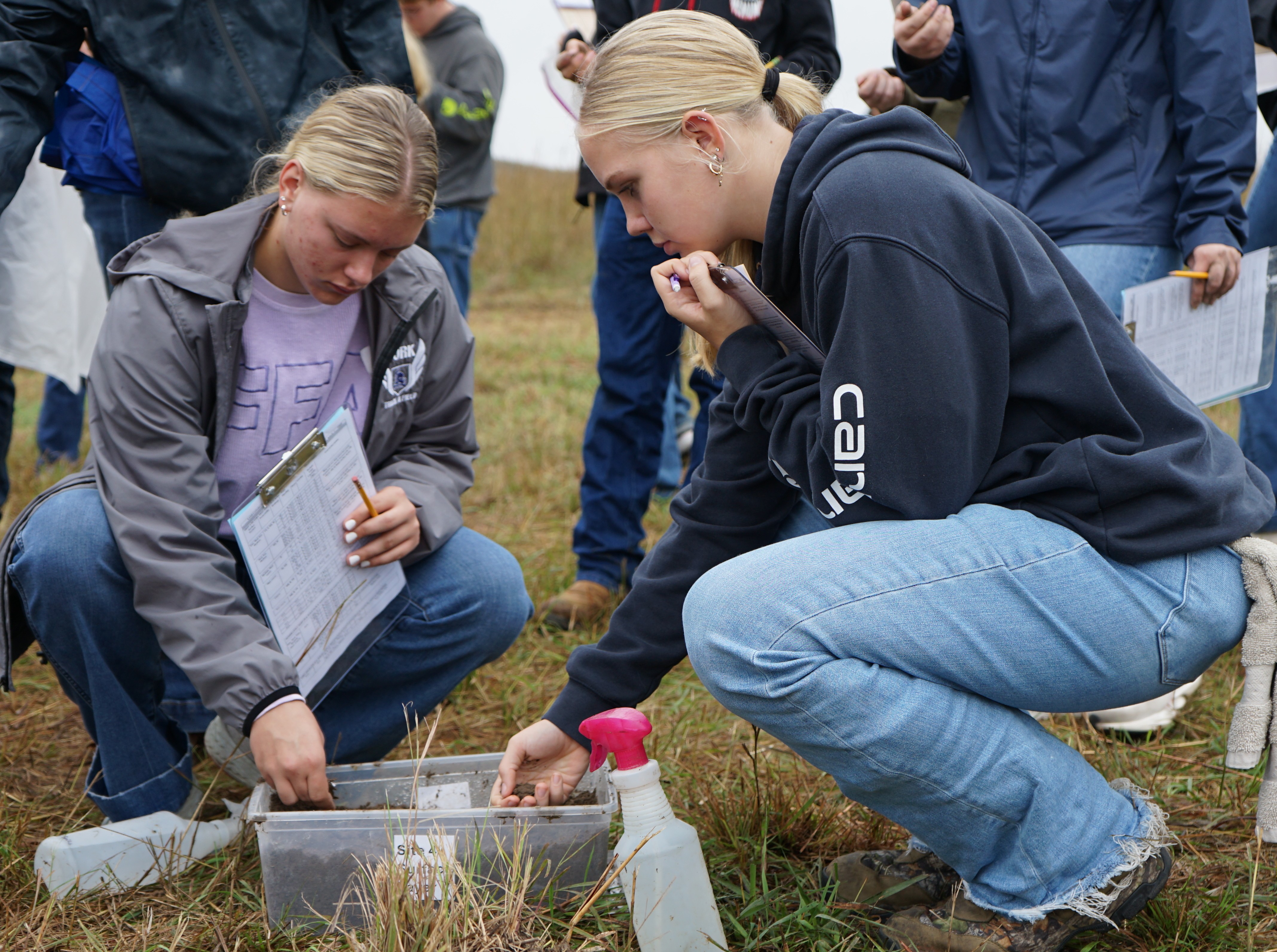 Students test soil texture at 2026 South Central Land Judging Contest