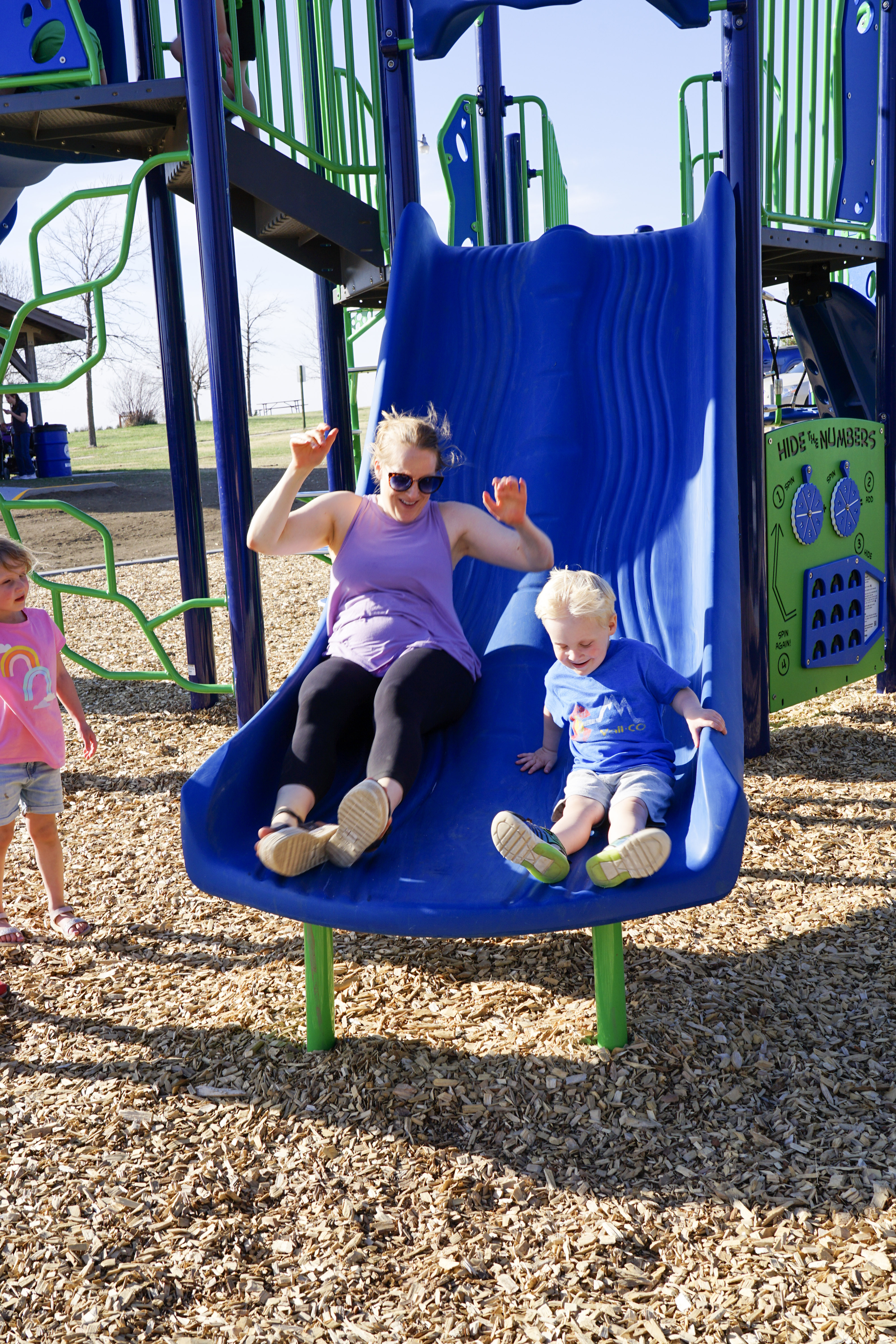 mom and son on slide