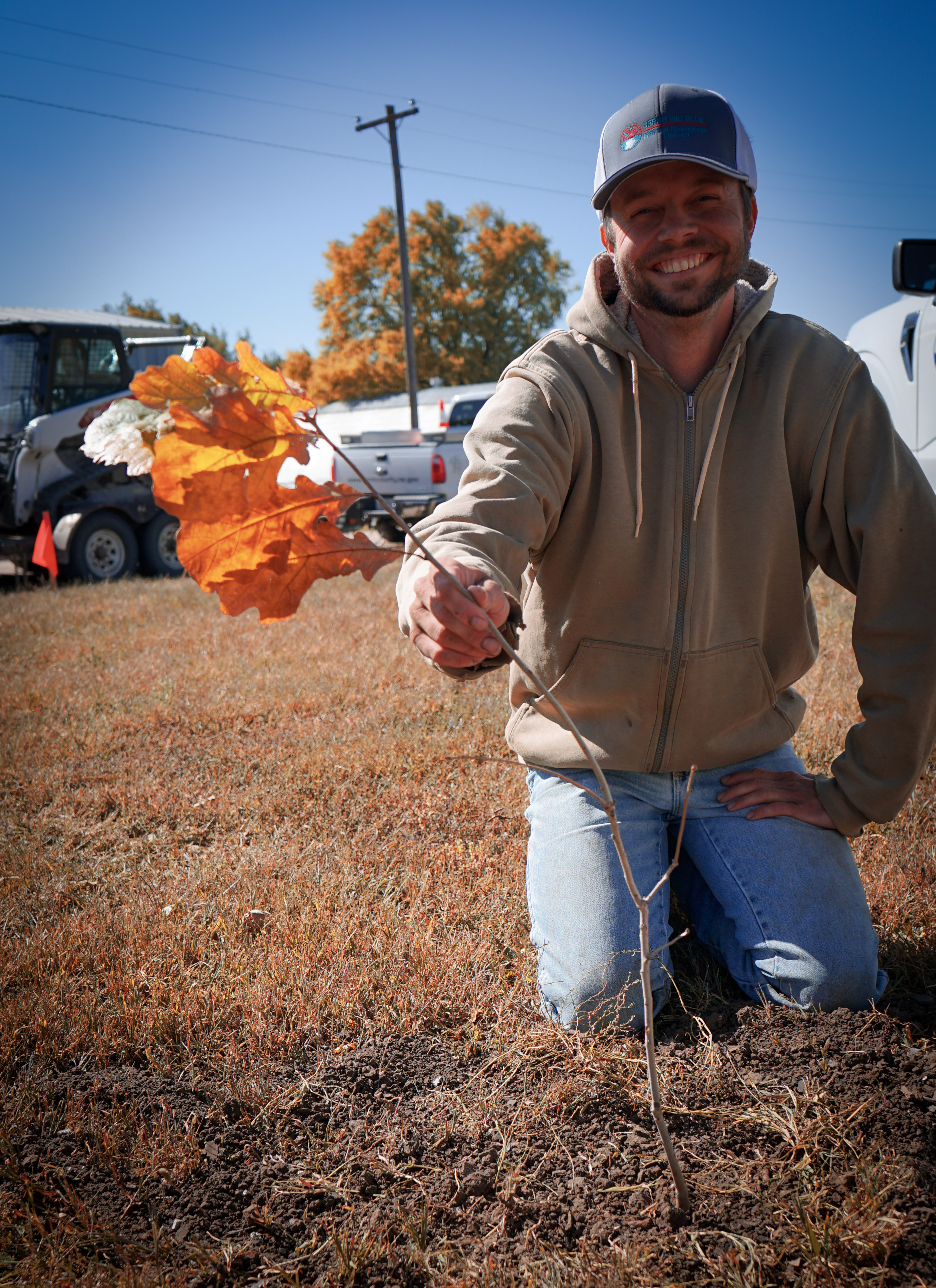 Kyle planting tree