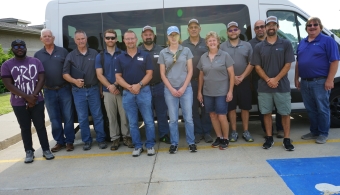 UBBNRD staff and directors pose in front of van